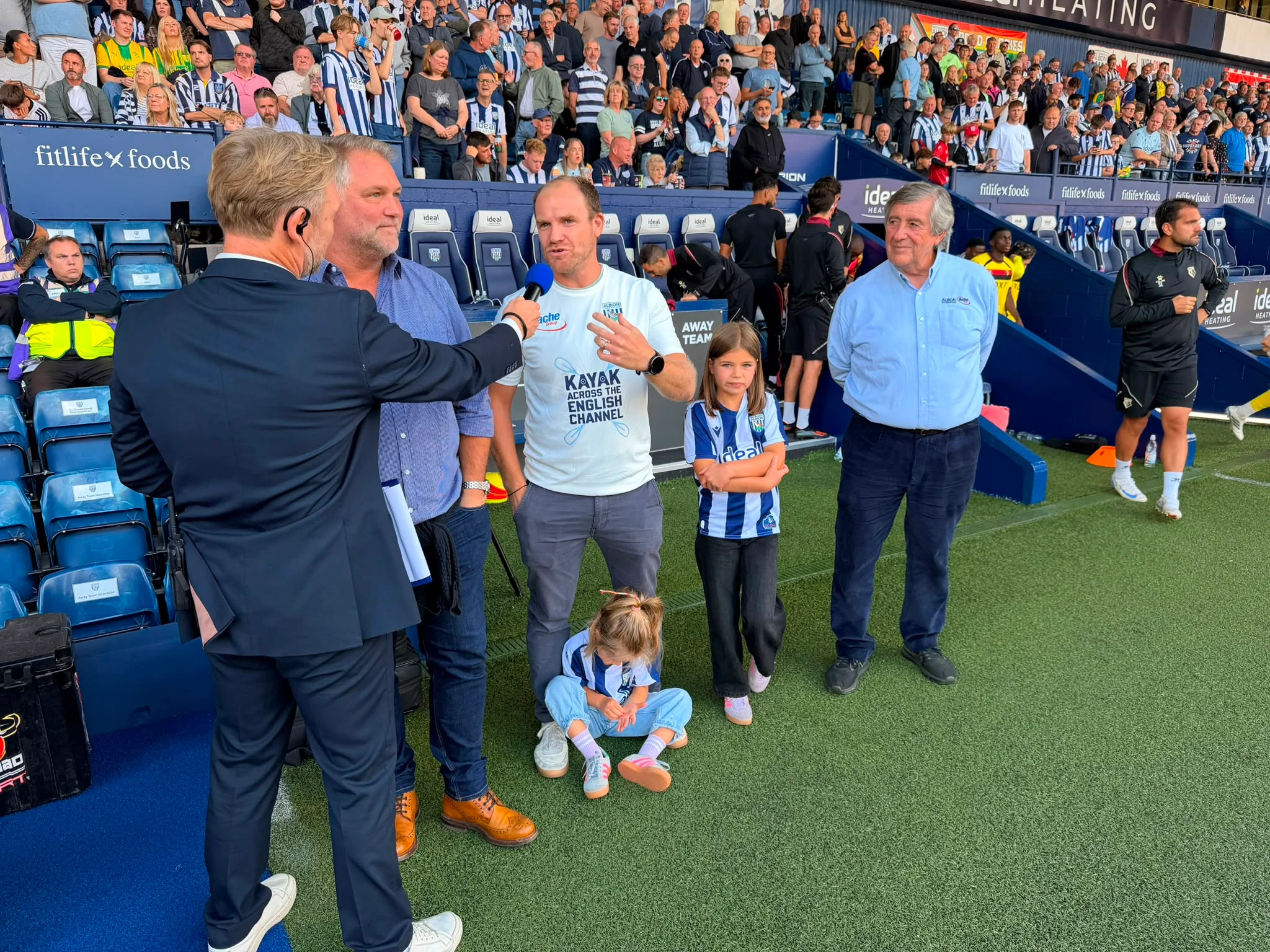 Pitchside interview during an Albion Foundation presentation